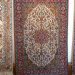 Esfahani Persian Rug Gallery
 ORIGIN: IRAN/ STYLE: ISFAHAN / DESIGN: MEDALION
 PILE: SILK & FINE WOOL 	/ FOUNDATION: SILK
 LENGTH FT: 5.71/ WIDTH FT: 3.71/ SQF: 21.16
 LENGTH M: 1.74 / WIDTH M: 1.13/ SQM: 1.97
 APPROX AGE: OVER 20 YEARS NEW/ APPROX KPSI: 350
 INVENT # 1015



