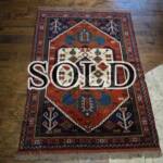 Esfahani Persian Rug Gallery
 ORIGIN: IRAN/ STYLE: GHUCHAN/ DESIGN: TRIBAL
 PILE: WOOL / FOUNDATION: WOOL
 LENGTH FT: 5.61/ WIDTH FT: 4.07/ SQF: 22.82
 LENGTH M: 1.71 / WIDTH M: 1.24 SQM: 2.12
 APPROX AGE: OVER 25 YEARS / APPROX KPSI: 100
 INVENT # 1382

