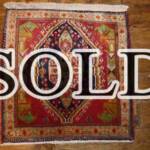 Esfahani Persian Rug Gallery
 ORIGIN: IRAN/ STYLE: SHIRAZ/ DESIGN: TRIBAL
 PILE: WOOL / FOUNDATION: WOOL
 LENGTH FT: 2.10/ WIDTH FT: 2.03/ SQF: 4.27
 LENGTH M: 0.64 / WIDTH M: 0.62SQM: 0.40
 APPROX AGE: OVER 25 YEARS / APPROX KPSI: 100
 INVENT # 1328	

