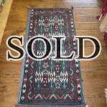 Esfahani Persian Rug Gallery
 ORIGIN: IRAN/ STYLE: BALUCHI/ DESIGN: TRIBAL
 PILE: WOOL / FOUNDATION: WOOL
 LENGTH FT: 3.94/ WIDTH FT: 1.84/ SQF: 7.23
 LENGTH M: 1.20 / WIDTH M: 0.56 SQM: 0.67
 APPROX AGE: OVER 25 YEARS / APPROX KPSI: 100
 INVENT # 1350	

