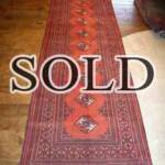 Esfahani Persian Rug Gallery
 ORIGIN: IRAN/ STYLE: BALUCHI/ DESIGN: TRIBAL
 PILE: WOOL / FOUNDATION: WOOL
 LENGTH FT: 9.61/ WIDTH FT: 3.35/ SQF: 32.17
 LENGTH M: 2.93 / WIDTH M: 1.02 SQM: 2.99
 APPROX AGE: OVER 25 YEARS / APPROX KPSI: 100
 INVENT # 1365	

